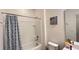 Bathroom featuring neutral color palette and a shower with tub combination, providing a relaxing space at 6041 Broad Oak Dr, Davenport, FL 33837