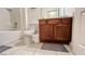 Bathroom featuring neutral tile flooring, vanity, toilet, and shower with tub combination at 6041 Broad Oak Dr, Davenport, FL 33837