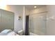 This white bathroom features a shower and tub combination and chrome fixtures at 6041 Broad Oak Dr, Davenport, FL 33837