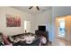 Inviting bedroom with a comfortable bed, dresser, and access to an outdoor area, offering a private retreat at 6041 Broad Oak Dr, Davenport, FL 33837