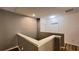 This hallway features neutral paint and doors with room numbers leading to the various rooms at 6041 Broad Oak Dr, Davenport, FL 33837