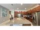 Well-equipped kitchen with a large island and stainless steel appliances, offering a functional and stylish space at 6041 Broad Oak Dr, Davenport, FL 33837