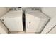 Close up on new white washer and dryer set at 6041 Broad Oak Dr, Davenport, FL 33837