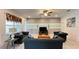 Comfortable living room with stylish seating, decorative lighting, and neutral tones at 6041 Broad Oak Dr, Davenport, FL 33837