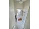Entryway featuring a modern door with frosted glass and a welcoming mat with a cheery message at 703 Ocean Course Ave, Davenport, FL 33896