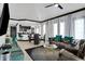 Spacious open-concept living area flowing into the dining room and kitchen at 7503 Mourning Dove Cir # 101, Reunion, FL 34747