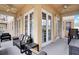 Spacious patio features comfortable seating and multiple entry points, perfect for enjoying the outdoors at 7503 Mourning Dove Cir # 101, Reunion, FL 34747