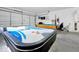 Garage is set up as an entertainment space with an air hockey table and pool table at 7807 Turkey Oak Ln, Kissimmee, FL 34747