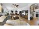 Open-concept living space with wood floors and modern decor at 8262 Bayview Crossing Dr, Winter Garden, FL 34787