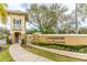 Lakeside community entrance sign with manicured landscaping and stone details at 8271 Maritime Flag St # 109, Windermere, FL 34786