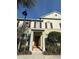Charming two-story townhouse with a welcoming front porch and well-maintained landscaping at 8271 Maritime Flag St # S, Windermere, FL 34786