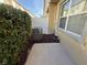 Back patio featuring a central air conditioning unit and partial privacy fence at 8271 Maritime Flag St # 109, Windermere, FL 34786