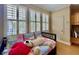 Charming room featuring built-in bookshelves, and playful decor at 907 Pawstand Rd, Celebration, FL 34747