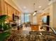 Bright kitchen with granite countertops, stainless steel appliances, and a center island at 907 Pawstand Rd, Celebration, FL 34747