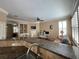 Open-concept living room featuring built-in shelving and views of the kitchen at 907 Pawstand Rd, Celebration, FL 34747