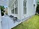 Back patio features a pergola and seating area, perfect for outdoor relaxation at 907 Pawstand Rd, Celebration, FL 34747