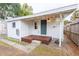 Charming backyard featuring a deck, privacy fence, and access to the home's exterior at 1007 11Th St, St Cloud, FL 34769