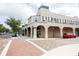 Exterior view of a historic building with arched walkways and a Hotel sign at 1007 11Th St, St Cloud, FL 34769