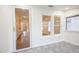 Sunroom with detailed tile floor, access to the main house, and lots of windows at 1007 11Th St, St Cloud, FL 34769