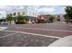 Street intersection with brick roads and pedestrian crosswalks, offering views of nearby businesses at 1007 11Th St, St Cloud, FL 34769