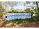 Lakefront Park sign with lush greenery, providing location information for visitors at 1007 11Th St, St Cloud, FL 34769