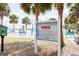 Lakefront splash pad featuring colorful water features, park rules, and palm trees at 1007 11Th St, St Cloud, FL 34769