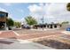 Wide street view featuring brick-paved roads, shops, and trees under a blue sky at 1007 11Th St, St Cloud, FL 34769