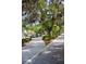 Picturesque tree-lined street with mature landscaping and sidewalks enhancing neighborhood appeal at 1007 11Th St, St Cloud, FL 34769