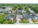 Aerial view of single-Gathering homes in a tree-lined neighborhood at 1050 Dees Dr, Oviedo, FL 32765
