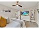 Bright bedroom with a ceiling fan, neutral walls, and ample space for relaxation and personalization at 1050 Dees Dr, Oviedo, FL 32765