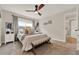 Serene bedroom with soft lighting, a comfortable bed, and stylish decor for a peaceful night's sleep at 1050 Dees Dr, Oviedo, FL 32765