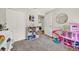Cozy bedroom with carpet, bright natural light and double door closet at 1050 Dees Dr, Oviedo, FL 32765