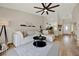Bright and airy living room with comfortable seating, modern decor, and an open layout at 1050 Dees Dr, Oviedo, FL 32765