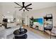 Open-concept living space with a modern kitchen, comfortable seating, and stylish accents at 1050 Dees Dr, Oviedo, FL 32765
