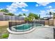 Backyard featuring a pool with safety fence and plenty of room for entertaining at 1050 Dees Dr, Oviedo, FL 32765