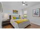 Bright bedroom with natural light, wood floors, and a decorative color pallete at 1103 Cypress Pointe Blvd, Davenport, FL 33896