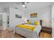 Bright bedroom with modern furniture and an ensuite bathroom at 1103 Cypress Pointe Blvd, Davenport, FL 33896