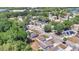 An aerial shot of the neighborhood with mature trees and close proximity to local amenities at 118 Deacon Jones Blvd, Orlando, FL 32810