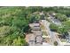 An aerial view of the neighborhood with mature trees and well-maintained streets at 118 Deacon Jones Blvd, Orlando, FL 32810