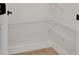 Walk-in pantry features white wire racks and ample storage space at 118 Deacon Jones Blvd, Orlando, FL 32810