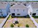 Aerial view showcasing the home's backyard, privacy fence, and patio area at 1181 Lone Palm Way, St Cloud, FL 34771