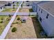 Aerial view displays the backyard, patio, and surrounding neighborhood at 1181 Lone Palm Way, St Cloud, FL 34771