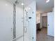 Bathroom featuring a glass-enclosed shower with tile accents at 1181 Lone Palm Way, St Cloud, FL 34771