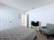 Cozy bedroom featuring neutral walls, carpet floor, and double-door closet at 1181 Lone Palm Way, St Cloud, FL 34771