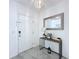 Welcoming entryway with marble floors, a modern light fixture, and stylish accents at 1181 Lone Palm Way, St Cloud, FL 34771