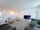 Neutral carpet, plush seating and wall-mounted TV in upstairs living area at 1181 Lone Palm Way, St Cloud, FL 34771