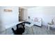 Bright office featuring a marble-topped desk, modern decor, and comfortable white leather seating at 1181 Lone Palm Way, St Cloud, FL 34771