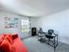 Bright office space featuring sofa, desk with computer, and natural light at 1181 Lone Palm Way, St Cloud, FL 34771