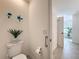 A clean toilet room with tiled floors and decor at 1181 Lone Palm Way, St Cloud, FL 34771