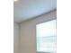 Bright bedroom featuring a window with natural light illuminating the interior at 12537 Encore At Ovation Way, Winter Garden, FL 34787